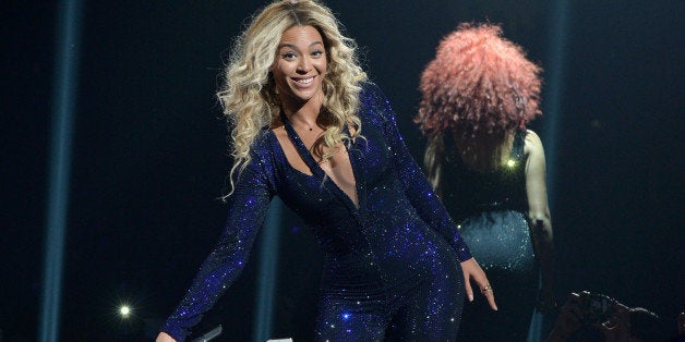 LOS ANGELES, CA - DECEMBER 03: Entertainer Beyonce performs on stage during 'The Mrs. Carter Show World Tour' at the Staples Center on December 3, 2013 in Los Angeles, California. (Photo by Larry Busacca/PW/WireImage for Parkwood Entertainment)