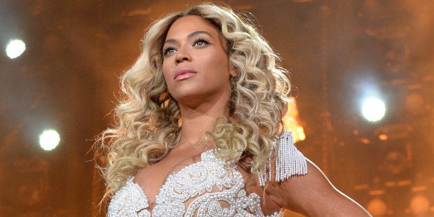 LOS ANGELES, CA - DECEMBER 03: Entertainer Beyonce performs on stage during 'The Mrs. Carter Show World Tour' at the Staples Center on December 3, 2013 in Los Angeles, California. (Photo by Larry Busacca/PW/WireImage for Parkwood Entertainment)