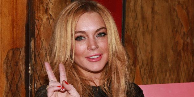 NEW YORK, NY - DECEMBER 16: Lindsay Lohan attends the 'Just Sing It' app launch event at Pravda on December 16, 2013 in New York City. (Photo by Robin Marchant/Getty Images)