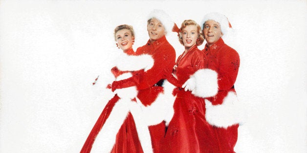 Vera-Ellen, Danny Kaye, Rosemary Clooney and Bing Crosby dressed in Christmas stage costumes in a scene from the film 'White Christmas', 1954. (Photo by Paramount/Getty Images)