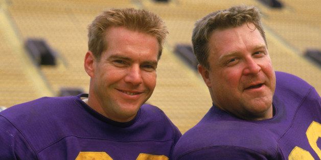 UNSPECIFIED - APRIL 27: Medium shot of Dennis Quaid as Gavin Grey and John Goodman as Lawrence; both wearing football uniforms. (Photo by Warner Bros./Getty Images)