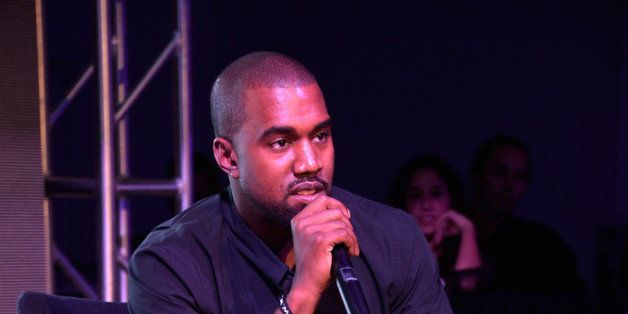 MIAMI, FL - DECEMBER 05: Kanye West speaks at Surface Magazine's DesignDialogues No. 6 With Hans Ulrich Obrist, Kanye West And Jacques Herzog at Moore Building on December 5, 2013 in Miami, Florida. (Photo by Frazer Harrison/Getty Images for Surface Magazine)