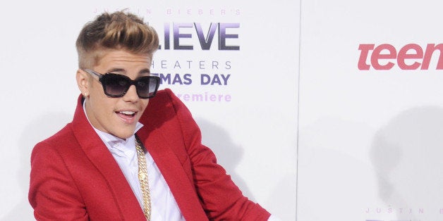 LOS ANGELES, CA - DECEMBER 18: Singer Justin Bieber arrives at the world premiere of 'Justin Bieber's Believe' at Regal Cine