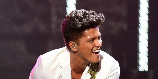 LAS VEGAS, NV - DECEMBER 31: Recording artist Bruno Mars performs during a New Year's Eve concert inside The Chelsea at The Cosmopolitan of Las Vegas on December 31, 2013 in Las Vegas, Nevada. (Photo by Ethan Miller/WireImage)