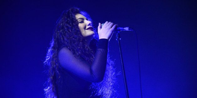 LOS ANGELES, CA - DECEMBER 08: Singer Lorde performs onstage at the 24th Annual KROQ Almost Acoustic Christmas at The Shrine Auditorium on December 8, 2013 in Los Angeles, California. (Photo by Jeff Kravitz/FilmMagic)