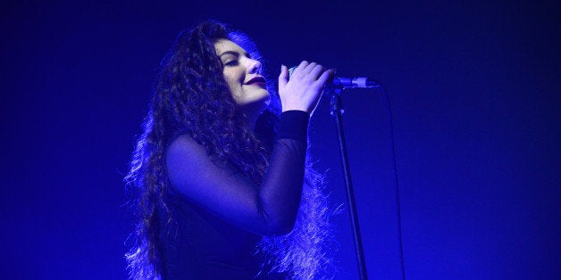 LOS ANGELES, CA - DECEMBER 08: Singer Lorde performs onstage at the 24th Annual KROQ Almost Acoustic Christmas at The Shrine Auditorium on December 8, 2013 in Los Angeles, California. (Photo by Jeff Kravitz/FilmMagic)