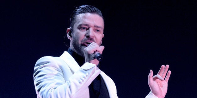 LOS ANGELES, CA - NOVEMBER 26: Singer Justin Timberlake performs at The Staples Center on November 26, 2013 in Los Angeles, California. (Photo by Kevin Winter/Getty Images)