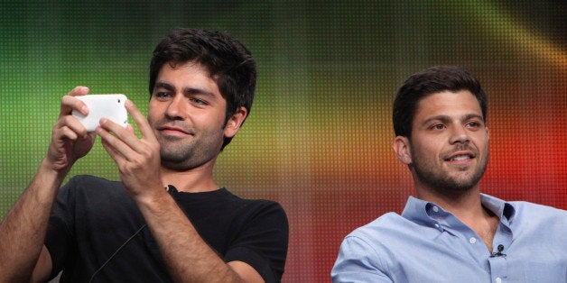 (L-R) Actors Adrian Grenier and Jerry Ferrara speak during HBO's 'Entourage' TCA Panel during the 2011 Summer TCA Tour at the Beverly Hilton on July 28, 2011 in Beverly Hills, California.