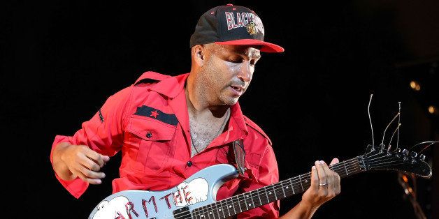 HOLLYWOOD, CA - SEPTEMBER 06: Guitarist Tom Morello performs onstage during 'Rock Out!' at Ford Theatre on September 6, 2013 in Hollywood, California. (Photo by Imeh Akpanudosen/Getty Images)