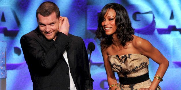 CENTURY CITY, CA - JANUARY 30: Actors Sam Worthington (L) and Zoe Saldana present Director James Cameron the Feature Film Nomination Plaque for 'Avatar' onstage during the 62nd Annual Directors Guild Of America Awards at the Hyatt Regency Century Plaza on January 30, 2010 in Century City, California. (Photo by Alberto E. Rodriguez/Getty Images for DGA)