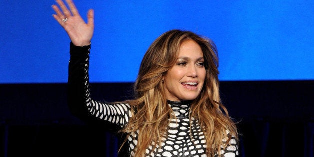 LOS ANGELES, CA - JANUARY 14: Singer Jennifer Lopez appears onstage at the premiere of Fox's 'American Idol Xlll' at UCLA's Royce Hall on January 14, 2014 in Los Angeles, California. (Photo by Kevin Winter/Getty Images)