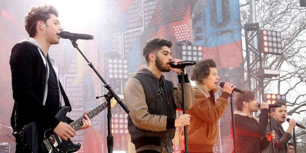 GOOD MORNING AMERICA - One Direction performs live from Central Park on 'Good Morning America,' 11/26/13, airing on the ABC Television Network. (Photo by Lou Rocco/ABC via Getty Images)ONE DIRECTION