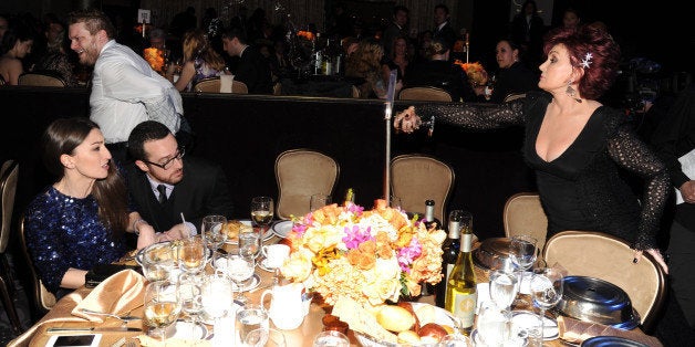 LOS ANGELES, CA - JANUARY 25: Jordan Feldstein and Sharon Osbourne during the 56th annual GRAMMY Awards Pre-GRAMMY Gala and Salute to Industry Icons honoring Lucian Grainge at The Beverly Hilton on January 25, 2014 in Los Angeles, California. (Photo by Kevin Mazur/WireImage)