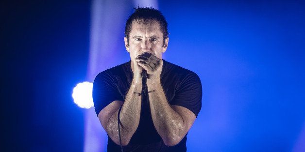 SAINT-CLOUD, FRANCE - AUGUST 24: Trent Reznor from Nine Inch Nails performs at Rock en Seine on August 24, 2013 in Saint-Cloud, France. (Photo by David Wolff - Patrick/Redferns via Getty Images)