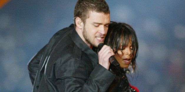Justin Timberlake and Janet Jackson perform during the half - time show at Super Bowl XXXVIII (Photo by J. Shearer/WireImage)