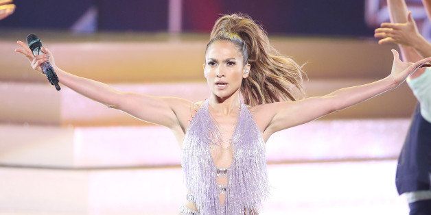 LOS ANGELES, CA - NOVEMBER 24: Jennifer Lopez performs onstage at the 2013 American Music Awards held at Nokia Theatre L.A. Live on November 24, 2013 in Los Angeles, California. (Photo by Michael Tran/FilmMagic)