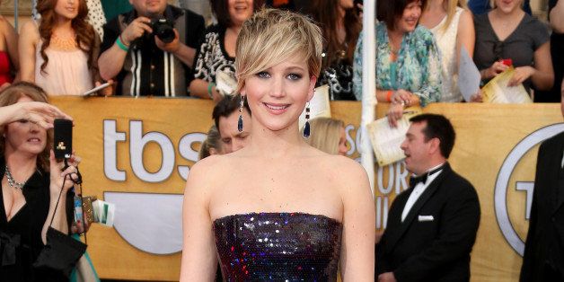 LOS ANGELES, CA - JANUARY 18: Jennifer Lawrence arrives at the 20th Annual Screen Actors Guild Awards at the Shrine Auditorium on January 18, 2014 in Los Angeles, California. (Photo by Dan MacMedan/WireImage)
