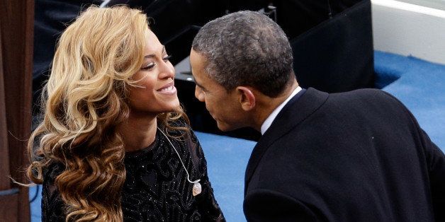 WASHINGTON, DC - JANUARY 21: U.S. President Barack Obama greets singer Beyonce after she performed the National Anthem during the public ceremonial inauguration on the West Front of the U.S. Capitol January 21, 2013 in Washington, DC. Barack Obama was re-elected for a second term as President of the United States. (Photo by Rob Carr/Getty Images)