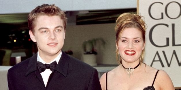 BEVERLY HILLS, CA - JANUARY 18: Actor Leonardo DiCaprio (L) arrives with co-star Kate Winslet for the 55th Annual Golden Globe Awards at the Beverly Hilton 18 January in Beverly Hills, CA. DiCaprio is nominated for Best Actor in the drama category for his role in 'Titanic'. 'Titanic' is also nominated for Best Picture, Best Director and Best Actress in the same category. (Photo credit should read HAL GARB/AFP/Getty Images)