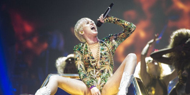 VANCOUVER, BC - FEBRUARY 14: American singer Miley Cyrus opens her 'Bangerz Tour' at Pepsi Live at Rogers Arena on February 14, 2014 in Vancouver, Canada. (Photo by Phillip Chin/Getty Images)