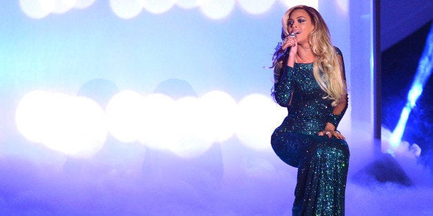LONDON, ENGLAND - FEBRUARY 19: Beyonce performs at The BRIT Awards 2014 at 02 Arena on February 19, 2014 in London, England.
