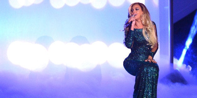 LONDON, ENGLAND - FEBRUARY 19: Beyonce performs at The BRIT Awards 2014 at 02 Arena on February 19, 2014 in London, England. (Photo by Karwai Tang/WireImage)