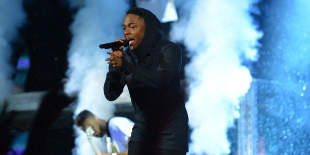 NEW ORLEANS, LA - FEBRUARY 15: Hip-hop artist Kendrick Lamar performing during the Sprite Slam Dunk Contest on State Farm All