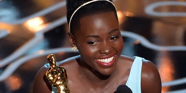 HOLLYWOOD, CA - MARCH 02: Actress Lupita Nyong'o accepts the Best Performance by an Actress in a Supporting Role award for '12 Years a Slave' onstage during the Oscars at the Dolby Theatre on March 2, 2014 in Hollywood, California. (Photo by Kevin Winter/Getty Images)