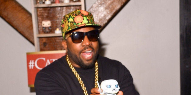 NEW ORLEANS, LA - FEBRUARY 16: Rapper and Host Big Boi with a Game of Thrones Pop Doll at the HBO Game of Thrones Catch The Throne All Star Weekend Event at Republic on February 16, 2014 in New Orleans, Louisiana. (Photo by Michael Loccisano/Getty Images for HBO)