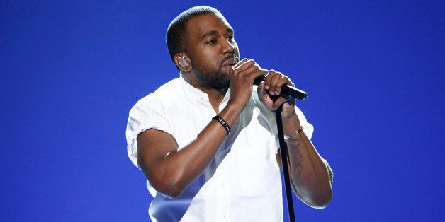 LATE NIGHT WITH SETH MEYERS -- Episode 0002 -- Pictured: Musical guest Kanye West performs on February 25, 2014 -- (Photo by:
