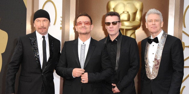 HOLLYWOOD, CA - MARCH 02: U2 arrives at the 86th Annual Academy Awards at Hollywood & Highland Center on March 2, 2014 in Ho