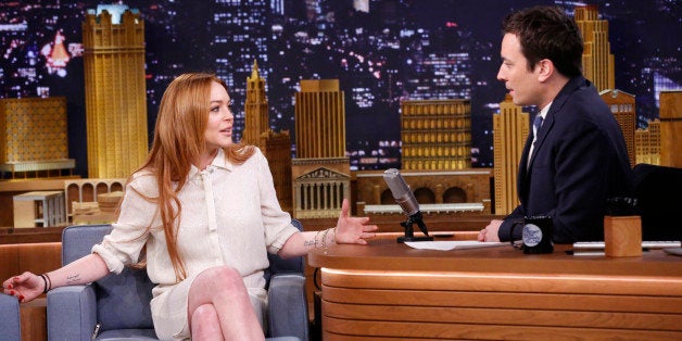 THE TONIGHT SHOW STARRING JIMMY FALLON -- Episode 0014 -- Pictured: (l-r) Lindsay Lohan during an interview with host Jimmy Fallon on March 6, 2014 -- (Photo by: Lloyd Bishop/NBC/NBCU Photo Bank via Getty Images)