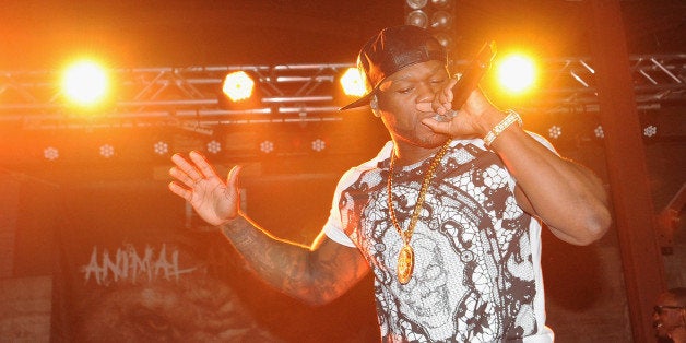 AUSTIN, TX - MARCH 11: Recording artist 50 Cent performs onstage during the 2014 SXSW Music, Film + Interactive Festivalon M