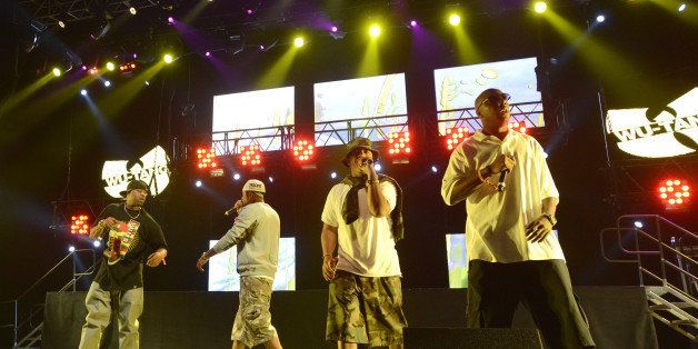 SAN BERNADINO, CA - SEPTEMBER 8: Members of The Wu-Tang Clan perform as part of the Rock the Bells Tenth Anniversary at San Manuel Amphitheatre on September 8, 2013 in San Bernadino, California. (Photo by Tim Mosenfelder/Getty Images)