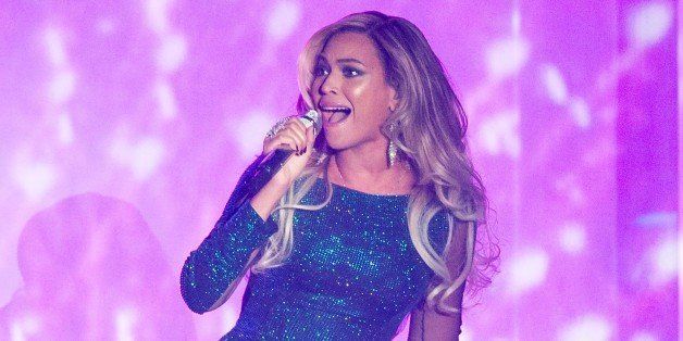LONDON, ENGLAND - FEBRUARY 19: Beyonce performs live onstage at The BRIT Awards 2014 at The O2 Arena on February 19, 2014 in London, England. (Photo by Samir Hussein/Redferns via Getty Images)