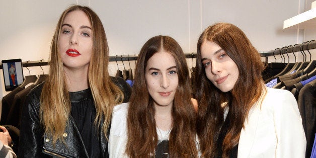 LONDON, ENGLAND - MARCH 13: (L to R) Este Haim, Danielle Haim and Alana Haim attend the Karl Lagerfeld European flagship sto