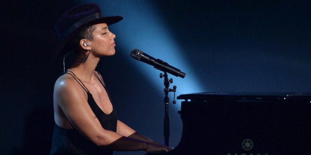 LOS ANGELES, CA - JANUARY 27: Recording artist Alicia Keys performs onstage during 'The Night That Changed America: A GRAMMY