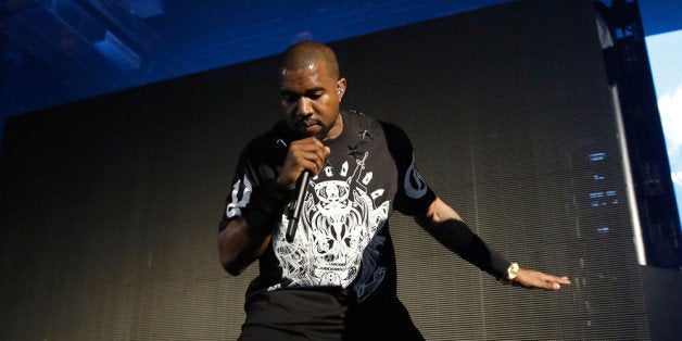 AUSTIN, TX - MARCH 12: Kanye West performs onstage as Samsung Galaxy presents JAY Z and Kanye West at SXSW on March 12, 2014