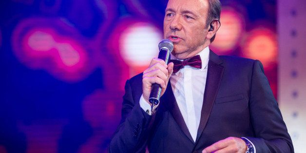 MACAU - MARCH 15: In this handout photo provided by Best Buddies, actor Kevin Spacey performs at the Venetian Ball 2014 to celebrate the launch of Best Buddies Macao Association on March 15, 2014 in Macau. (Photo by Best Buddies via Getty Images)