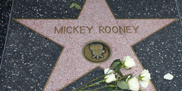 HOLLYWOOD, CA - APRIL 07: Flowers are placed on the Hollywood Walk of Fame Star in memory of Hollywood legend Mickey Rooney on April 7, 2014 in Hollywood, California. (Photo by David Livingston/Getty Images)