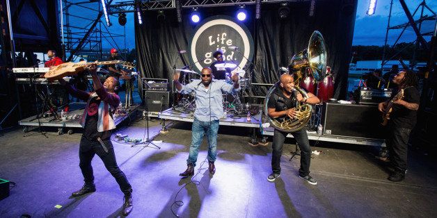 CANTON, MA - SEPTEMBER 21: (L-R) Captain Kirk Douglas, Questlove, Black Thought, Tuba Gooding Jr., of The Roots perform during the Life Is Good Festival 2013 at Prowse Farm on September 21, 2013 in Canton, Massachusetts. (Photo by Douglas Mason/Getty Images)