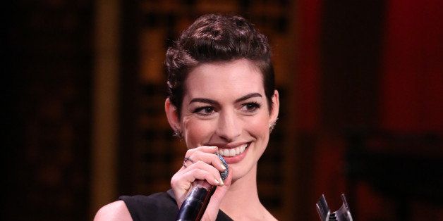THE TONIGHT SHOW STARRING JIMMY FALLON -- Episode 0037 -- Pictured: Actress Anne Hathaway during the 'Broadway Rap' skit on April 8, 2014 -- (Photo by: Nathaniel Chadwick/NBC/NBCU Photo Bank via Getty Images).