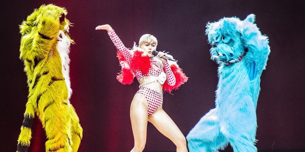 COLUMBUS, OH - APRIL 13: Miley Cyrus performs at Jerome Schottenstein Center on April 13, 2014 in Columbus, Ohio. (Photo by Patrick R. Murphy/Getty Images)