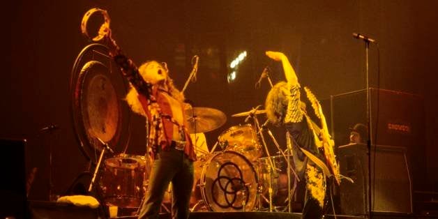 UNITED STATES - JANUARY 24: Photo of LED ZEPPELIN; L-R: Robert Plant, Jimmy Page performing live onstage at Richfield Coliseum (Photo by John Lynn Kirk/Redferns)