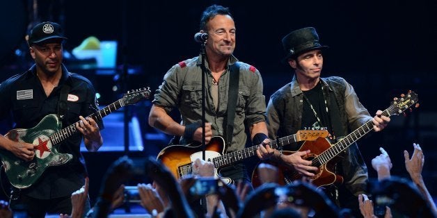 Bruce Springsteen, center, and members of the E Street Band perform at Time Warner Cable Arena in Charlotte, N.C., on Saturday, April 19, 2014. (Jeff Siner/Charlotte Observer/MCT via Getty Images)