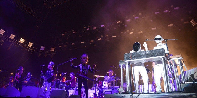 INDIO, CA - APRIL 20: Daft Punk performs with Arcade Fire live onstage to close out the 2014 Coachella Valley Music And Arts Festival at The Empire Polo Club on April 20, 2014 in Indio, California. (Photo by C Flanigan/FilmMagic)