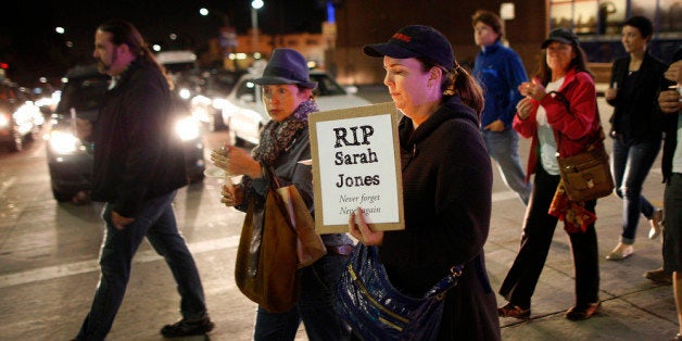 LOS ANGELES, CA - MARCH 7: People march along Sunset Boulevard from the Directors Guild of America to the International Cinematographers Guild national offices in a candlelight walk and memorial for Sarah Jones, an assistant camerawoman who was killed by a train while shooting the Gregg Allman biopic film, Midnight Rider, on March 7, 2014 in Los Angeles, California. The remembrance of the 27-year-old camerawoman is organized by members of the International Cinematographers Guild and the production community who want to highlight the importance of safety over a production's schedule or budget. The accident which occurred February 20 on a train trestle over the Altamaha River in Georgia and injured seven other crew members. Production on the film starring William Hurt and directed by Randall Miller has been suspended since the February 20 tragedy. (Photo by David McNew/Getty Images)