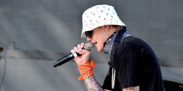 INDIO, CA - APRIL 13: Singer Justin Bieber performs with Chance The Rapper during Day 3 of the 2014 Coachella Valley Music & Arts Festival at the Empire Polo Club on April 13, 2014 in Indio, California. (Photo by Kevin Winter/Getty Images for Coachella)