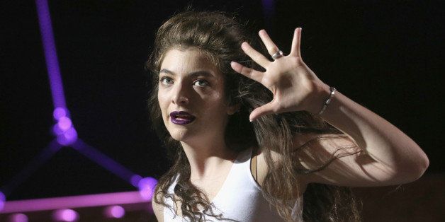 INDIO, CA - APRIL 12: Musician Lorde performs onstage during day 2 of the 2014 Coachella Valley Music & Arts Festival at the Empire Polo Club on April 12, 2014 in Indio, California. (Photo by Karl Walter/Getty Images for Coachella)