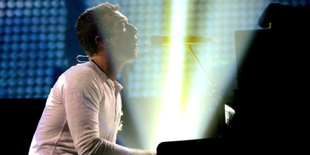 AUSTIN, TX - MARCH 11: Chris Martin of Coldplay performs as part of the iTunes Festival at the Moody Theater on March 11, 2014 in Austin, Texas. (Photo by Tim Mosenfelder/Getty Images)